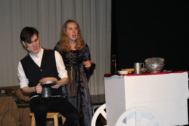 Students playing Sweeney Todd and Mrs Lovett singing