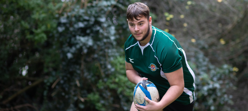 Alex Linscer- Student playing rugby