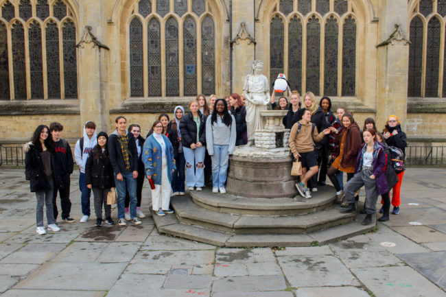 Group photo of students outside of the Abbey in Bath