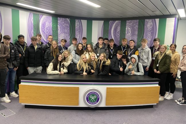 Group Photo of students at Wimbledon stadium