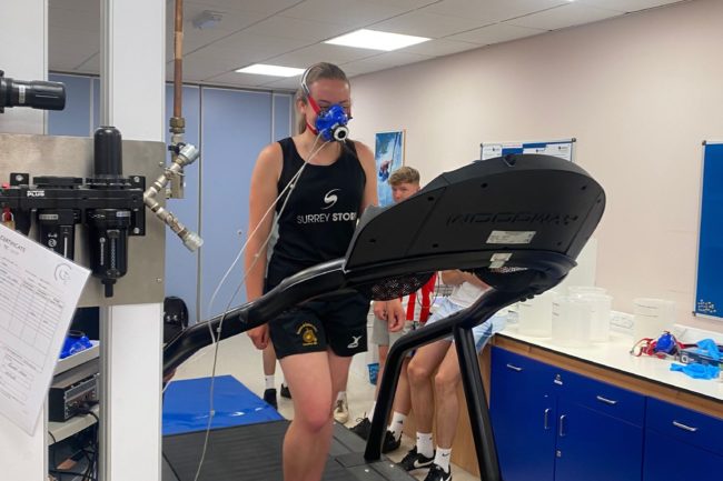 student on treadmill with breathing monitoring equipment
