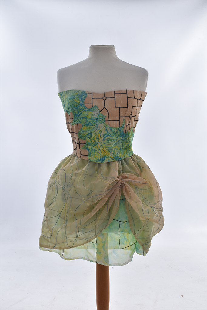 Strapless dress with textured full skirt on mannequin