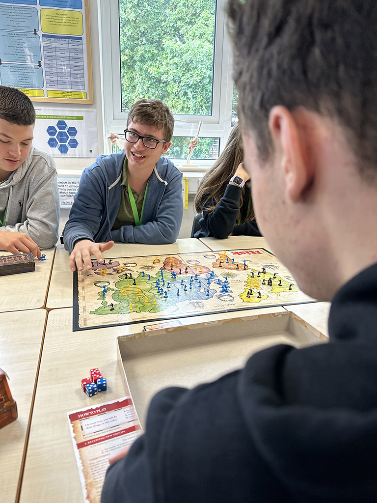 Students playing board games