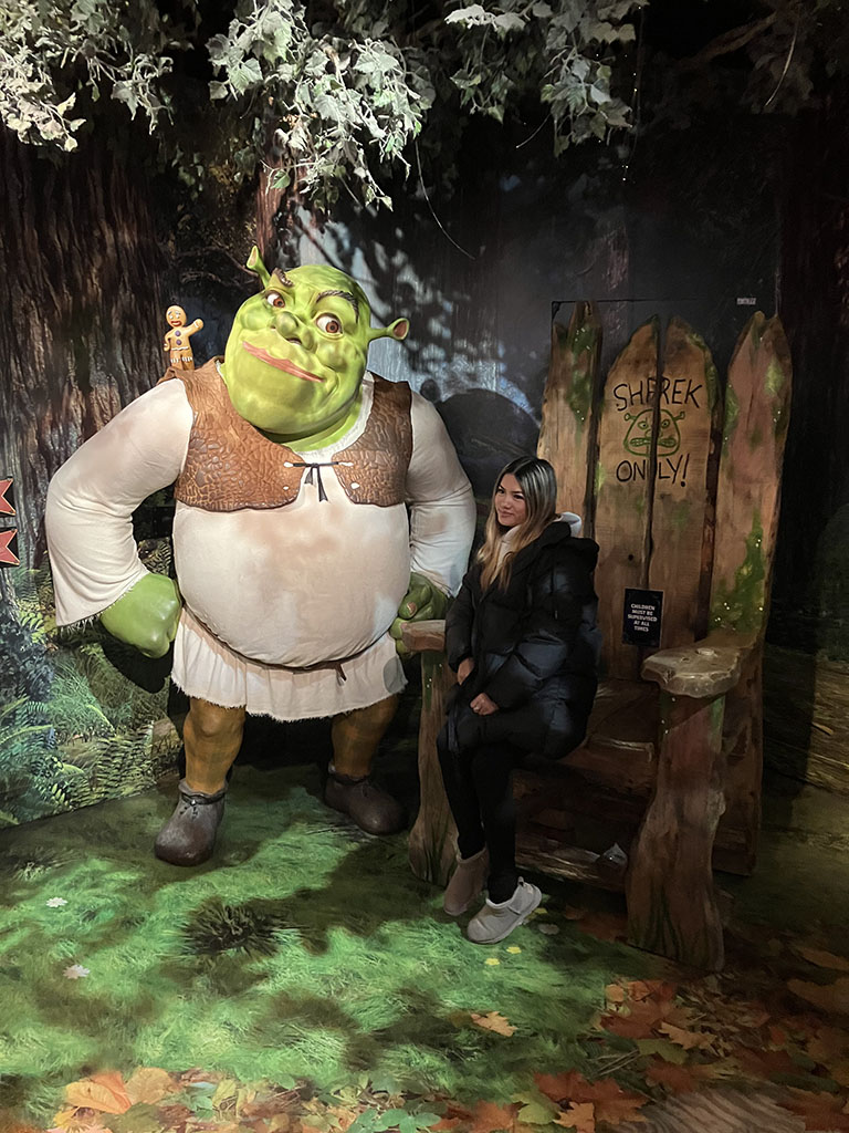Student with figure of Shrek