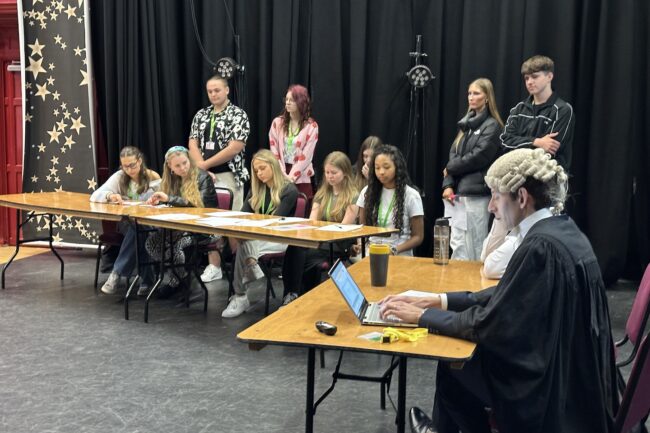 Students taking part in a mock cross-examination