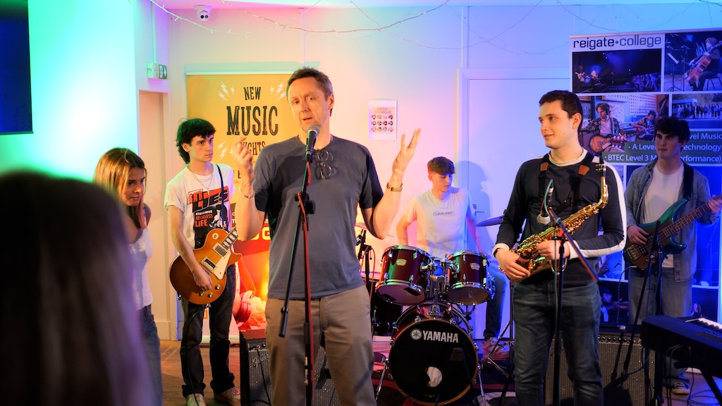 Six Student band performing  musi