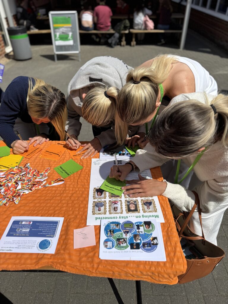 Students writing shout-out notes for staffs at college