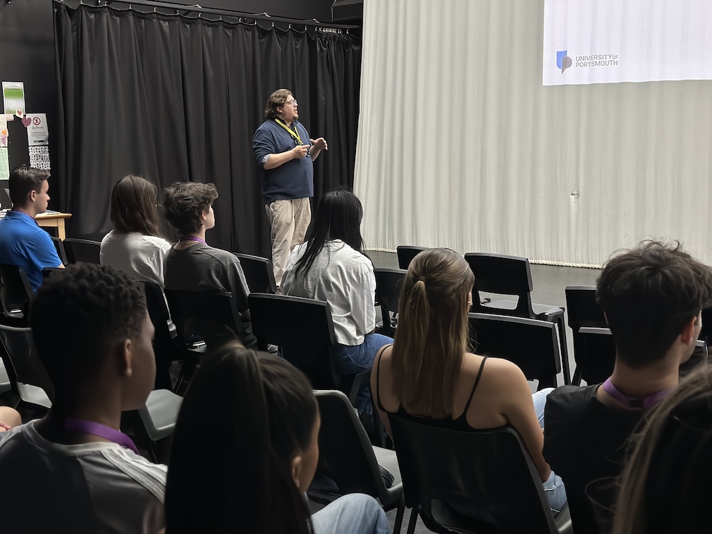 Students listening to a talk on applying for employment and apprenticeships.