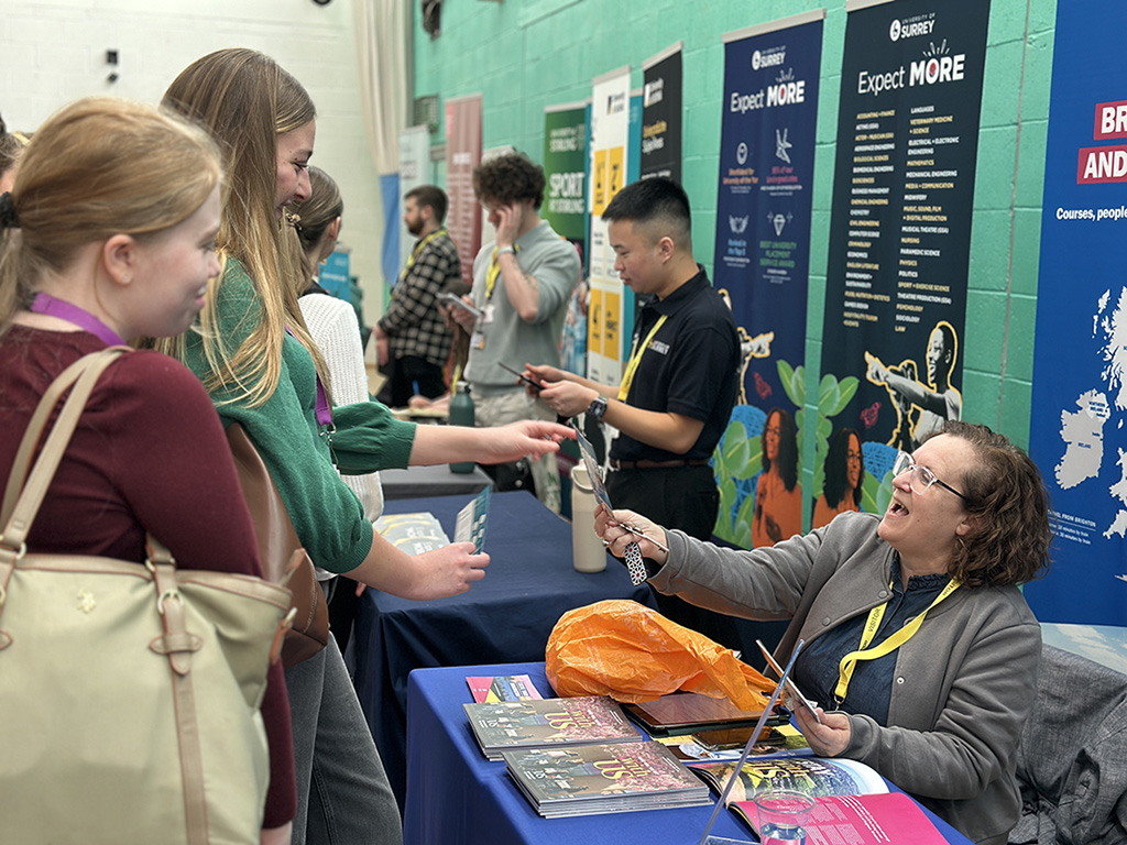 Female students speaking to an exhibitor on a stand at Get Ahead Day