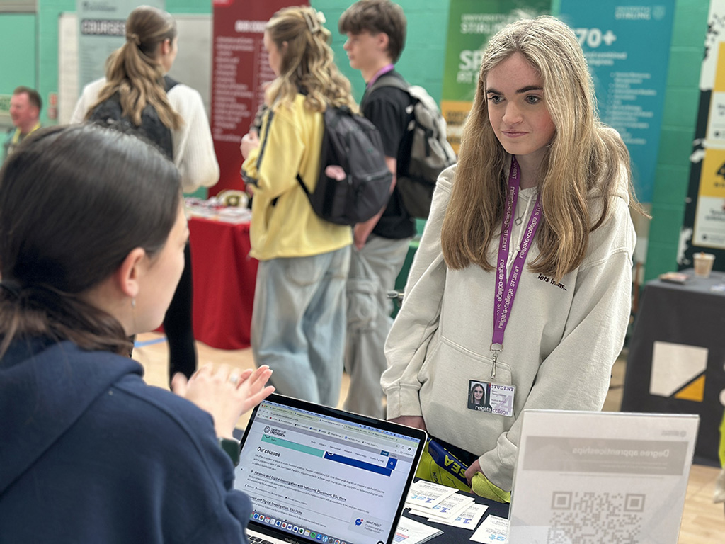 Female student speaking to an exhibitor on a stand at Get Ahead Day