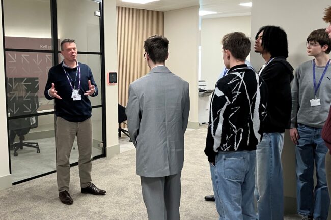 Andrew Todd addresses students at Kone, Woking visit