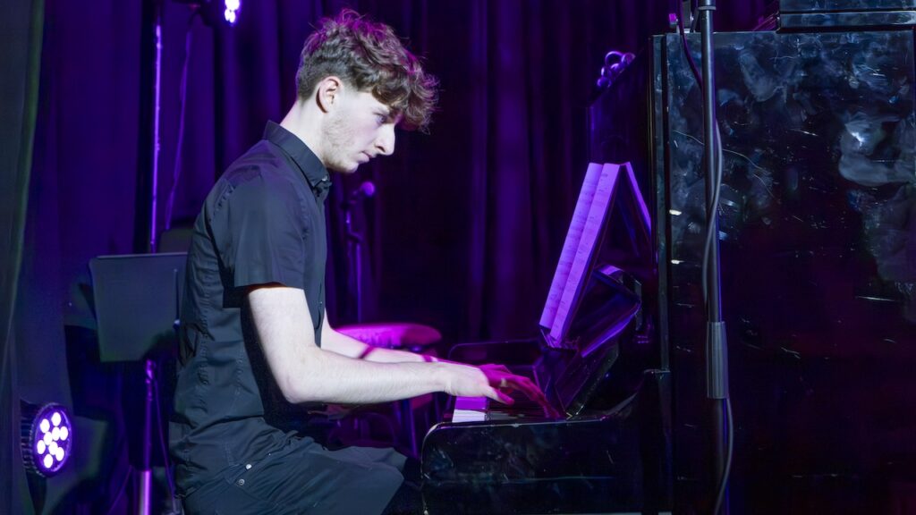 Students performing on stage in the Spring Concert