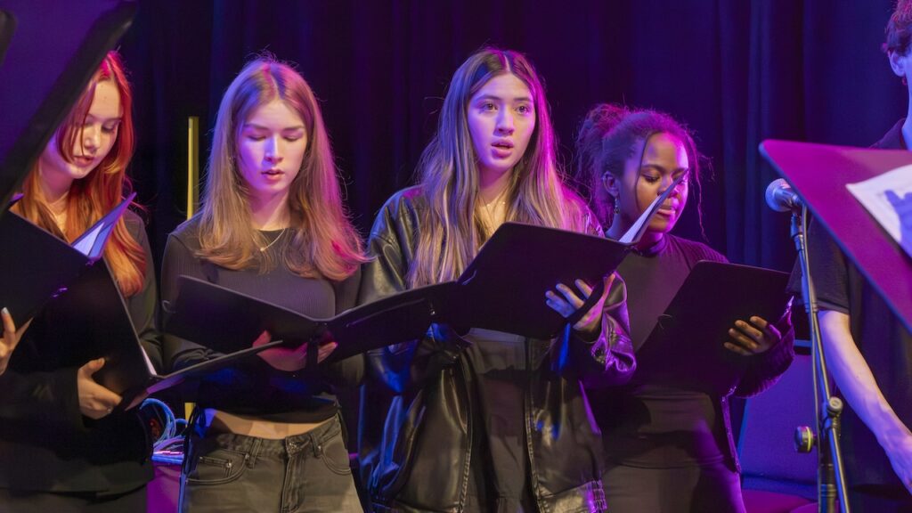 Students performing on stage in the Spring Concert