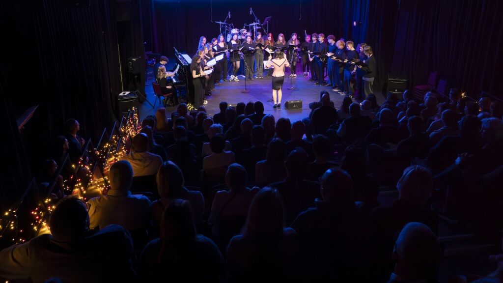 Students performing on stage in the Spring Concert