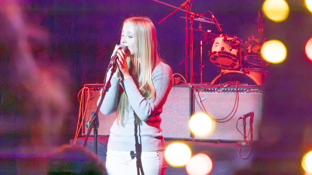 Students performing on stage in the Spring Concert