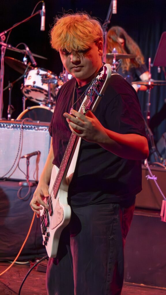 Students performing on stage in the Spring Concert