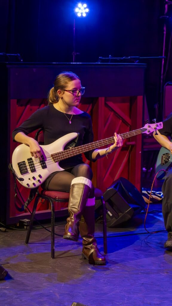 Students performing on stage in the Spring Concert
