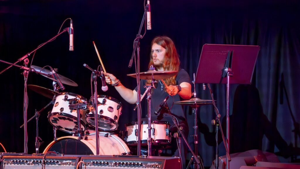 Students performing on stage in the Spring Concert