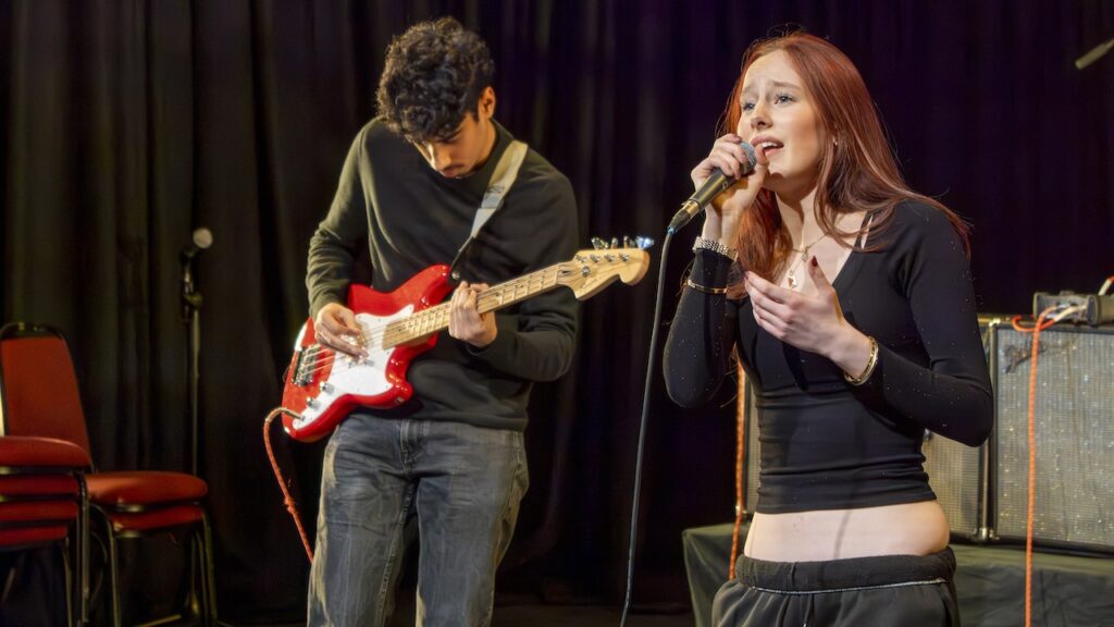 Students performing on stage in the Spring Concert