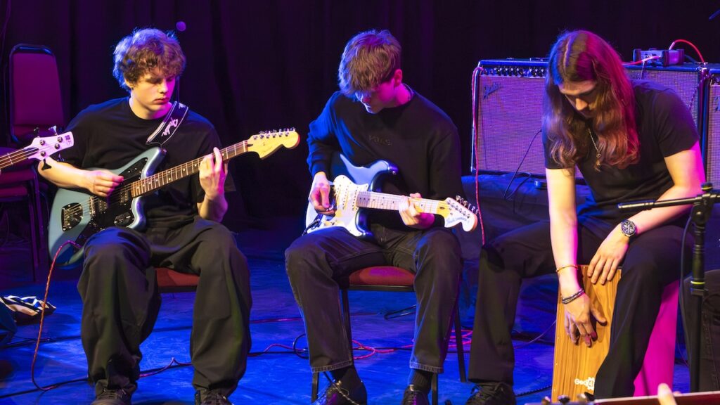 Students performing on stage in the Spring Concert