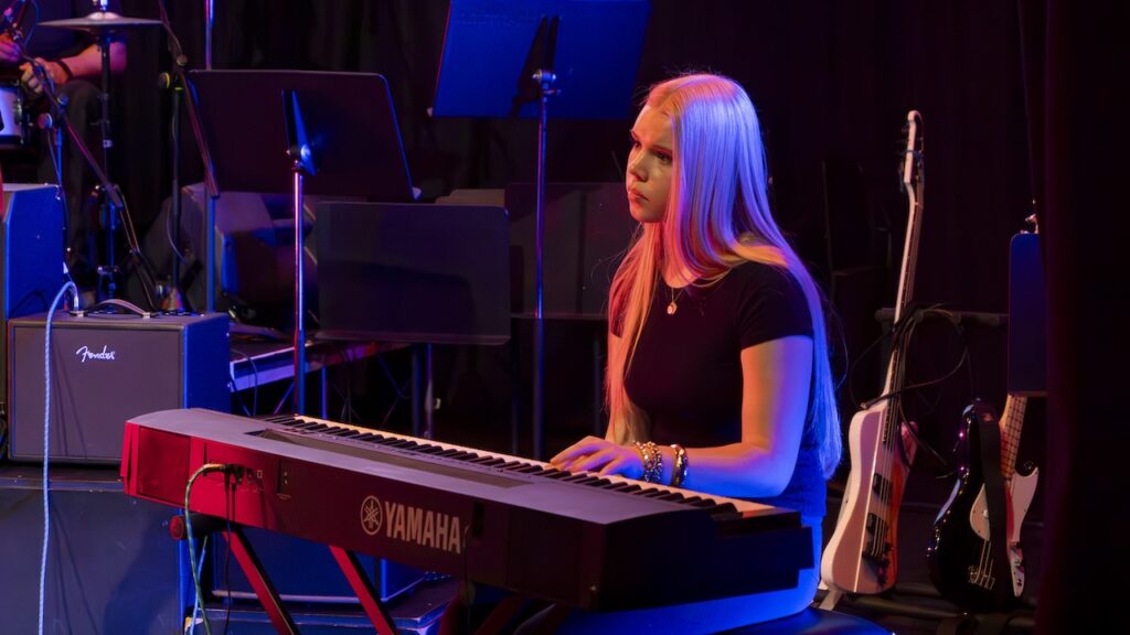 Students performing on stage in the Spring Concert