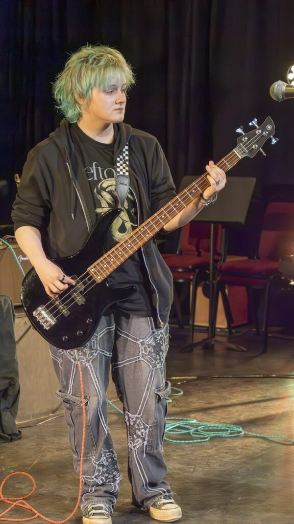 Students performing on stage in the Spring Concert