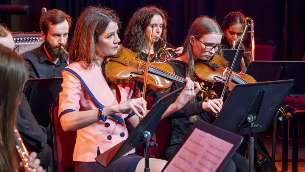 Students performing on stage in the Spring Concert