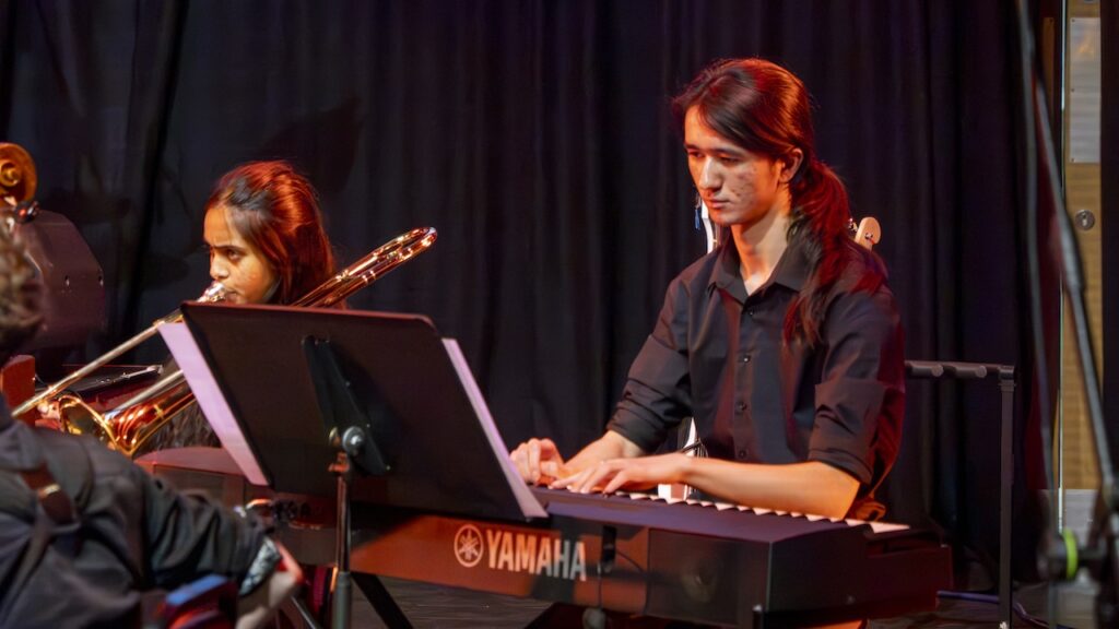 Students performing on stage in the Spring Concert
