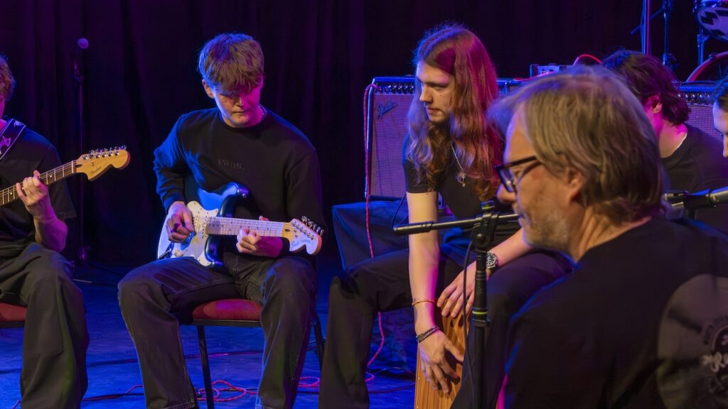 Students performing on stage in the Spring Concert