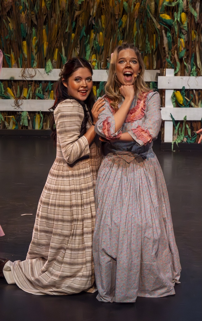 Students performing on stage in the production of Oklahoma - Ado Annie