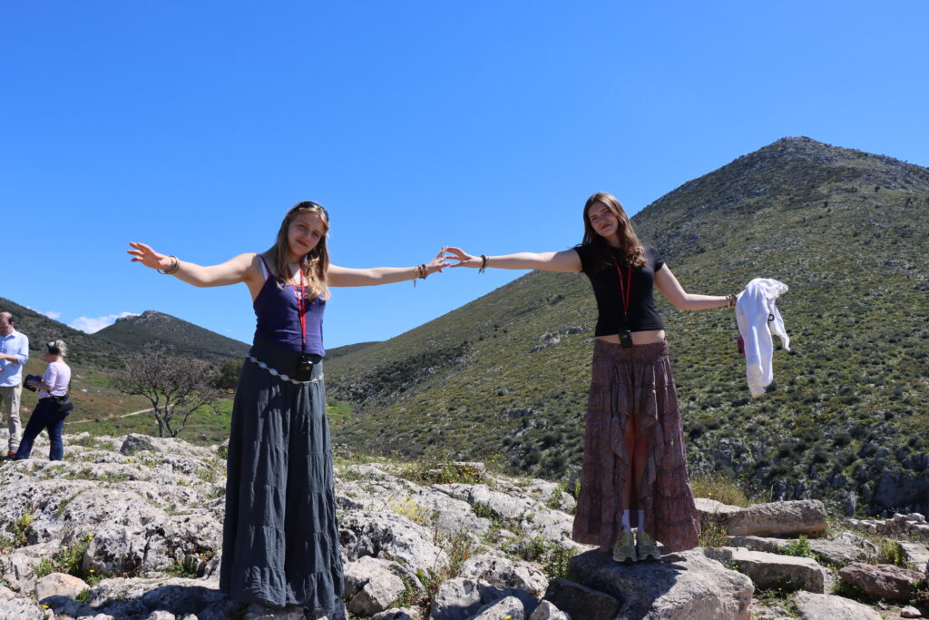 Two students pose at Mycenae