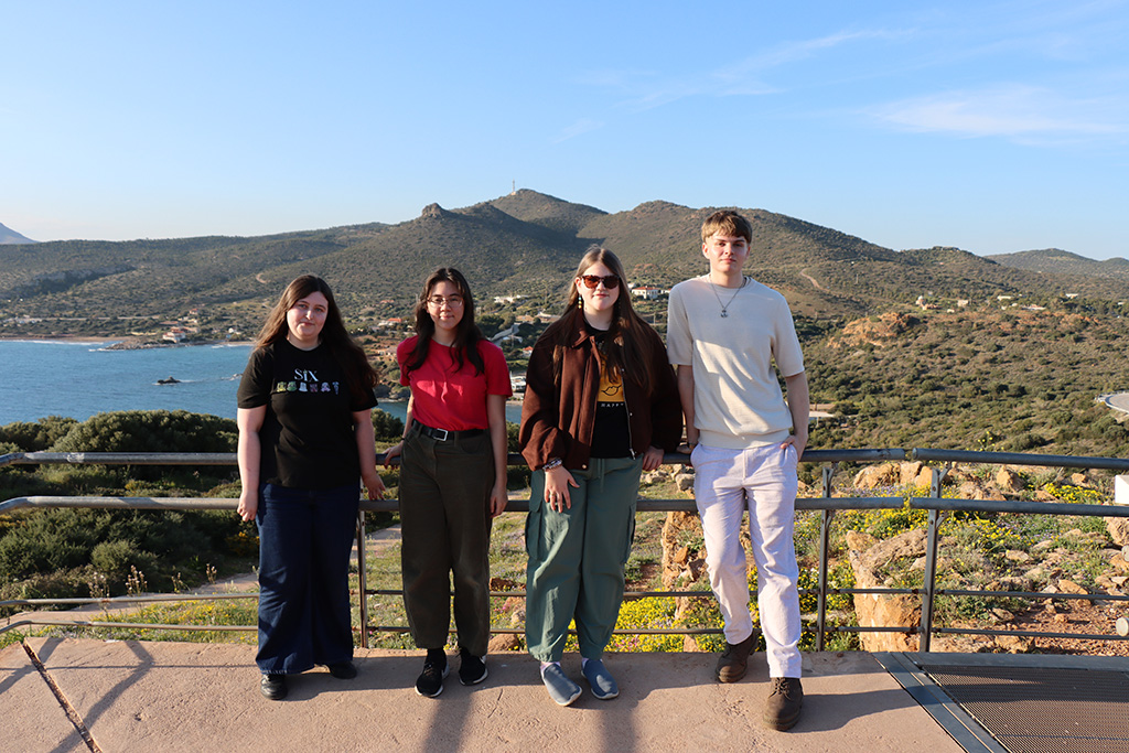 Four students at Cape Sounion