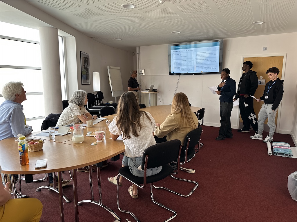 The students giving their presentation to the judges