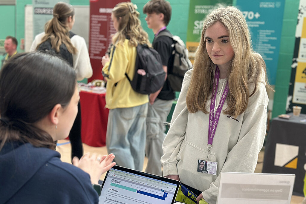 Female student speaking to an exhibitor on a stand at Get Ahead Day