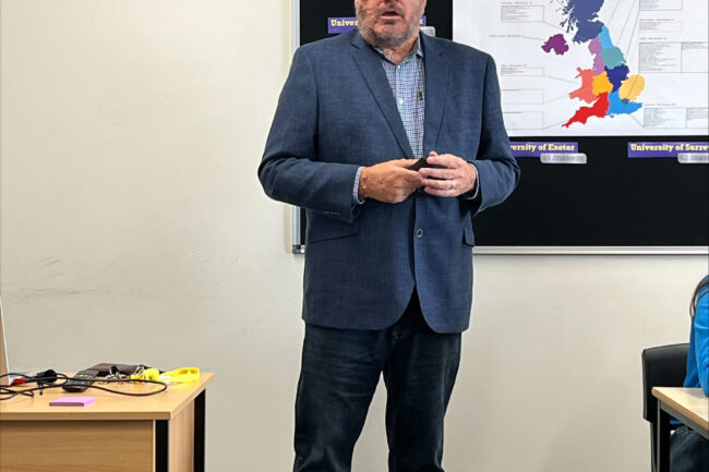 Outside speaker Oliver Bromley speaks to MVD students in the classroom