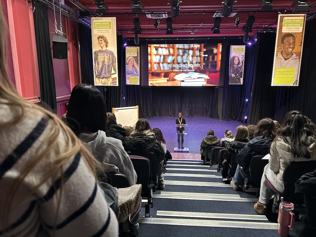 Student audience attending a presentation in the theatre