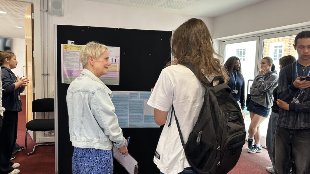 Psychology pathways posters being assessed by staff, judges and students