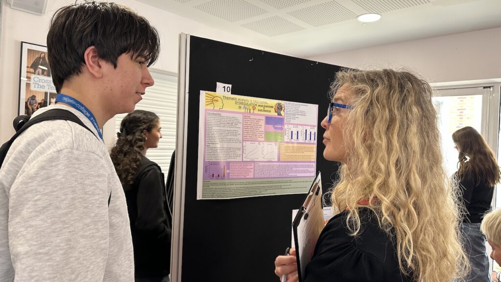 Psychology pathways posters being assessed by staff, judges and students