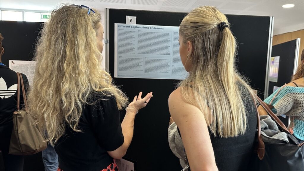 Psychology pathways posters being assessed by staff, judges and students