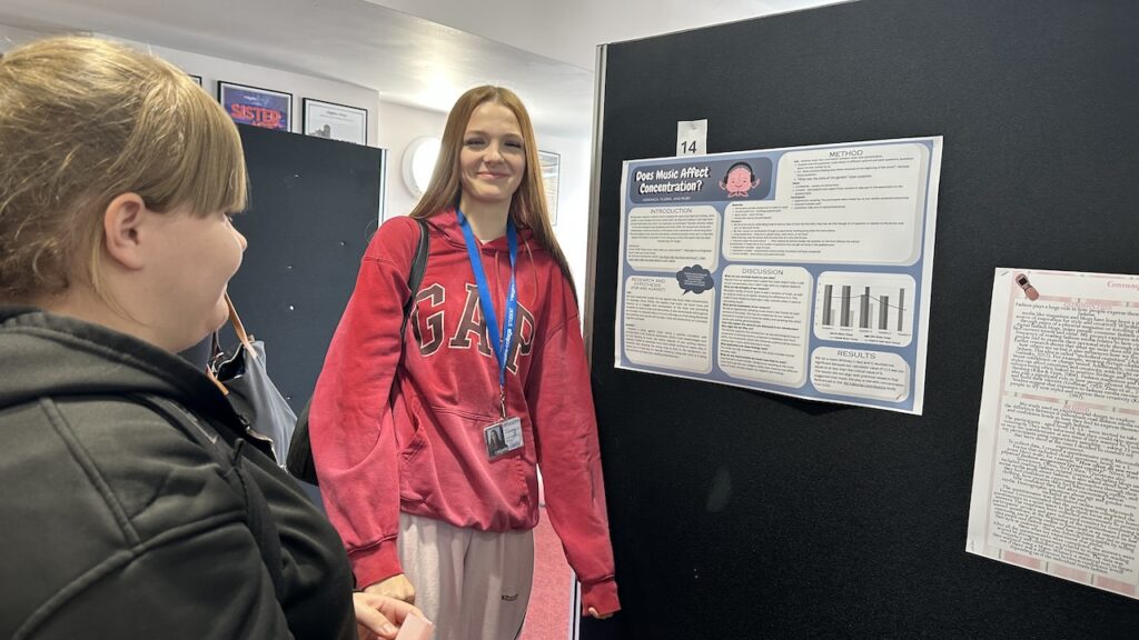Psychology pathways posters being assessed by staff, judges and students