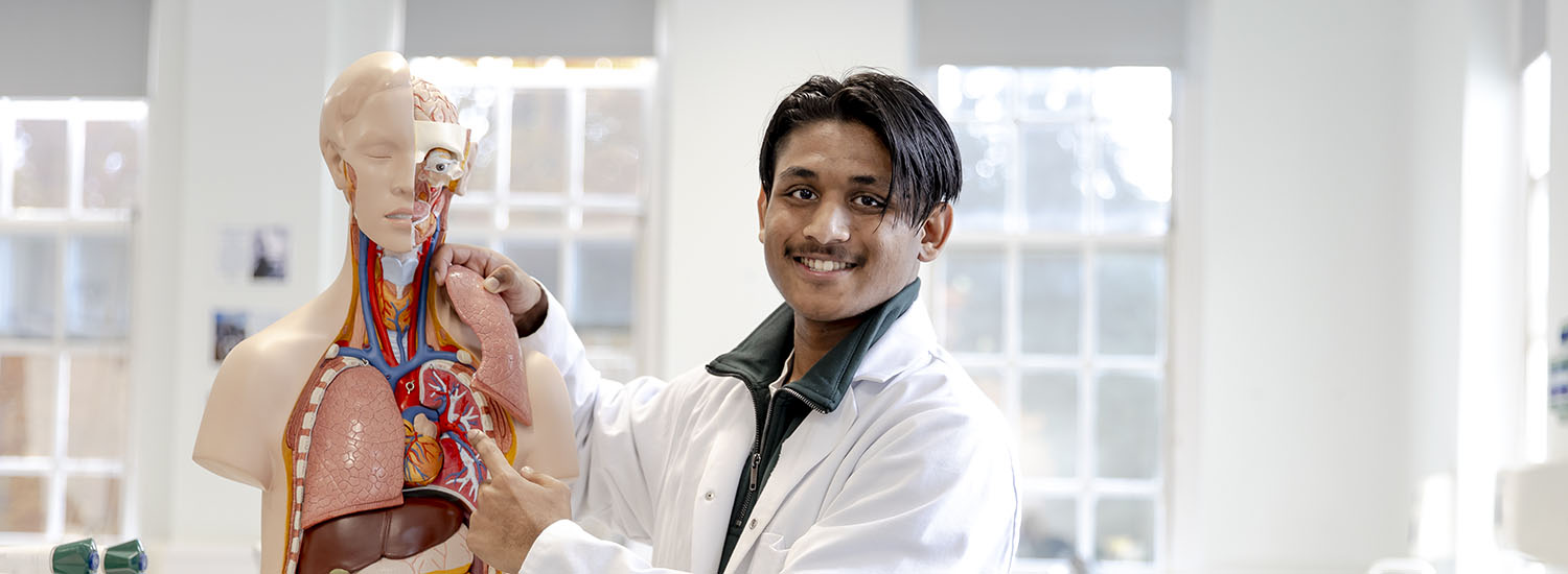 Male student in Biology lab