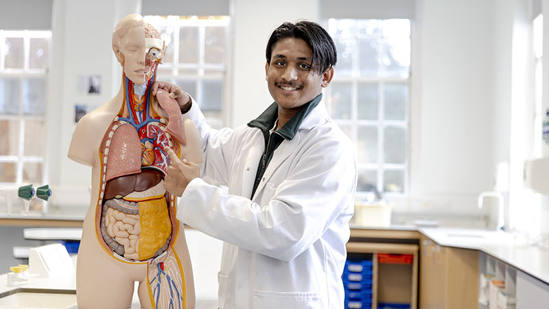 Male student in Biology laboratory